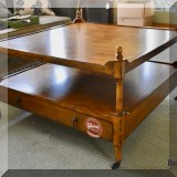 F55. Tiered coffee table with drawer. 